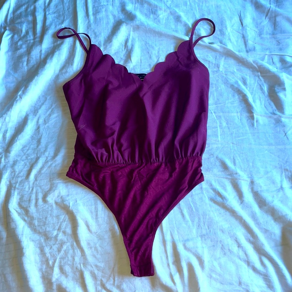 Boutique purple body suit